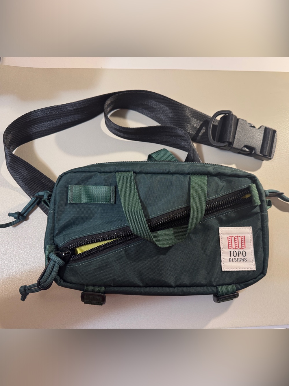 Topo Designs Dark Green Sling Belt Bag with Black Strap